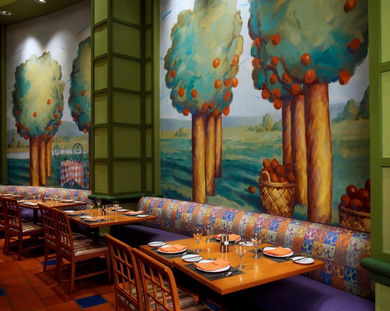 An interior view of the seating area in the Garden Grove restaurant at the Walt Disney World Swan Resort