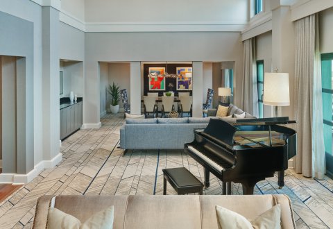 Dolphin Presidential Suite with Couches, Tables, Chairs and Grand Piano