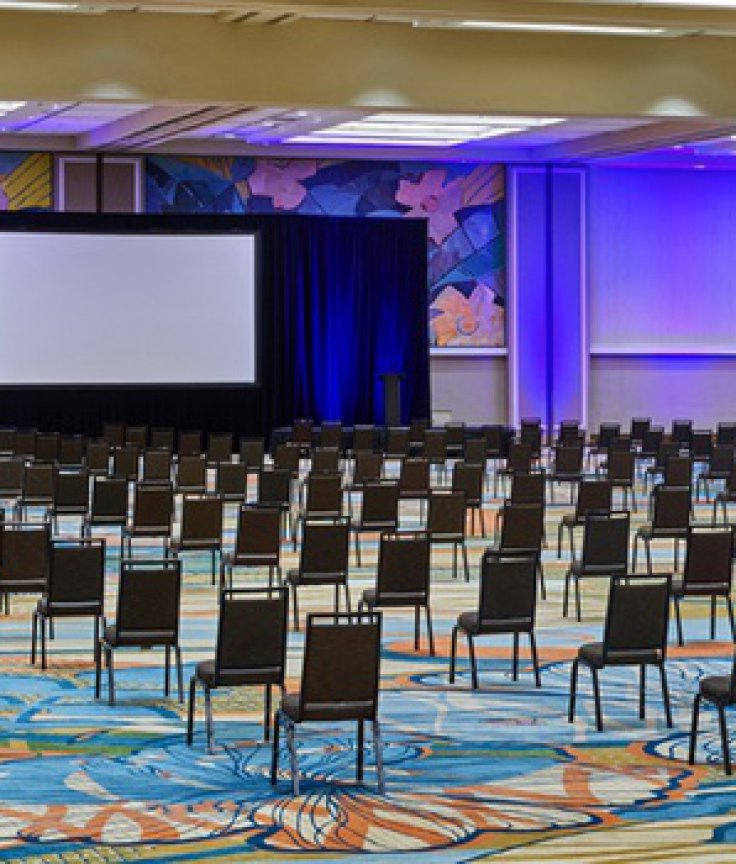 Large Meeting Room Theater Set with Chairs and Very Large Screen
