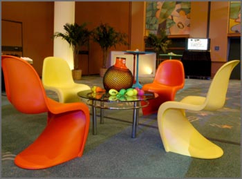 Low Table with Yellow and Red Designer Chairs