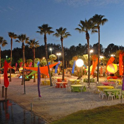 Tables and Chairs on the Beach at Night for an Event
