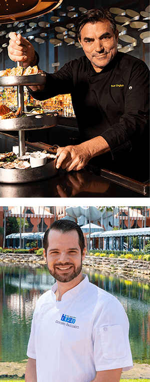 काले रंग की वर्दी पहने शेफ टॉड और शेफ गुस्तावो एक बहुस्तरीय ट्रे पर भोजन परोसने का बर्तन पकड़े हुए हैं, जबकि सफेद वर्दी पहने एक अन्य शेफ बाहर एक तालाब के पास खड़े होकर कैमरे की ओर मुस्कुरा रहे हैं।