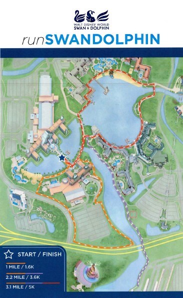 Um mapa colorido mostra três percursos de corrida — 1,6 km, 3,5 km e 5 km — ao redor do Dolphin resort Walt Disney World &amp; Dolphin resort, com a área de largada/chegada marcada por uma estrela azul perto dos edifícios do hotel.