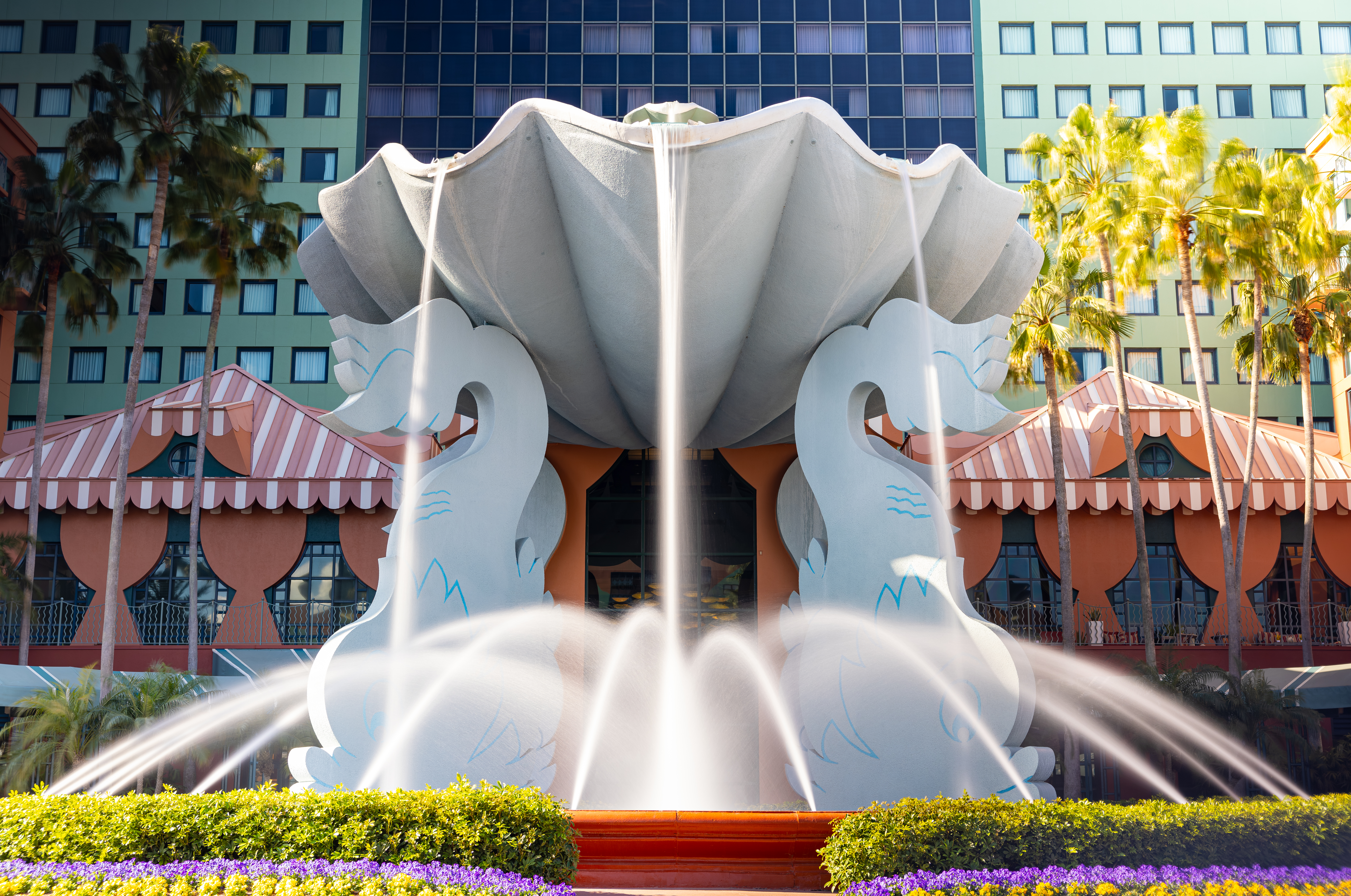 The Dolphin fountain with water pouring down and water jets spraying water up.